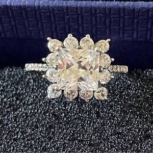 Sparking square cubic zirconia with halo surrounding it